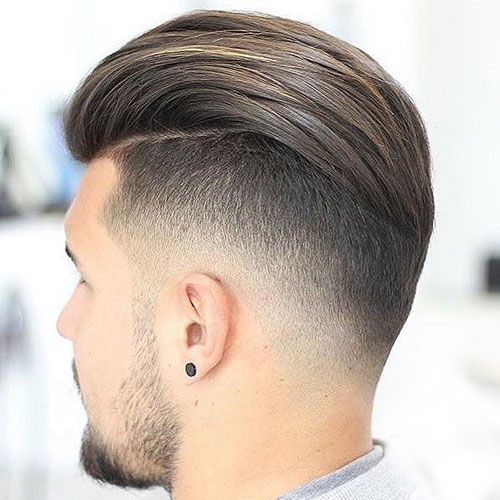 Slicked back haircut with undercut